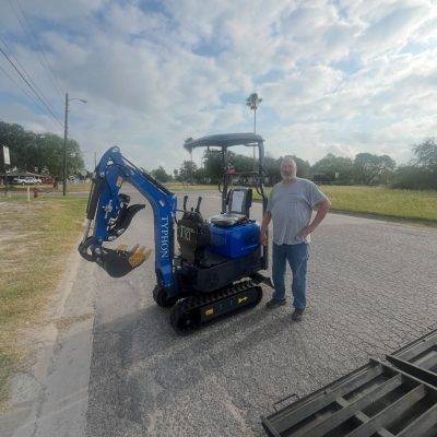 Customer Damien Herndon with excavator